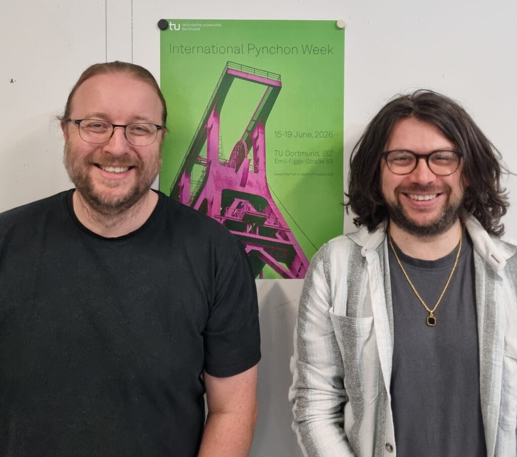 Sascha Pöhlmann and Burak Sezer in front of IPW poster 2026